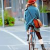 Woman With Hat On Bike paint by number